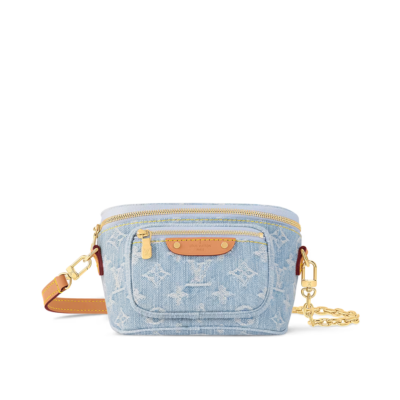 A summery Louis Vuitton Mini Bumbag in vintage-look sky blue Monogram denim, featuring a bleached and stonewashed finish, gold-tone hardware, a front pocket with an embossed leather label, and versatile removable chain and adjustable strap options.