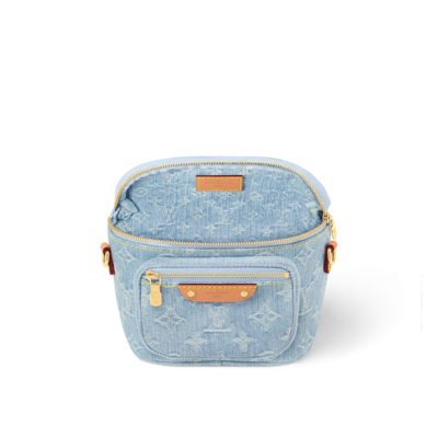 A summery Louis Vuitton Mini Bumbag in vintage-look sky blue Monogram denim, featuring a bleached and stonewashed finish, gold-tone hardware, a front pocket with an embossed leather label, and versatile removable chain and adjustable strap options.